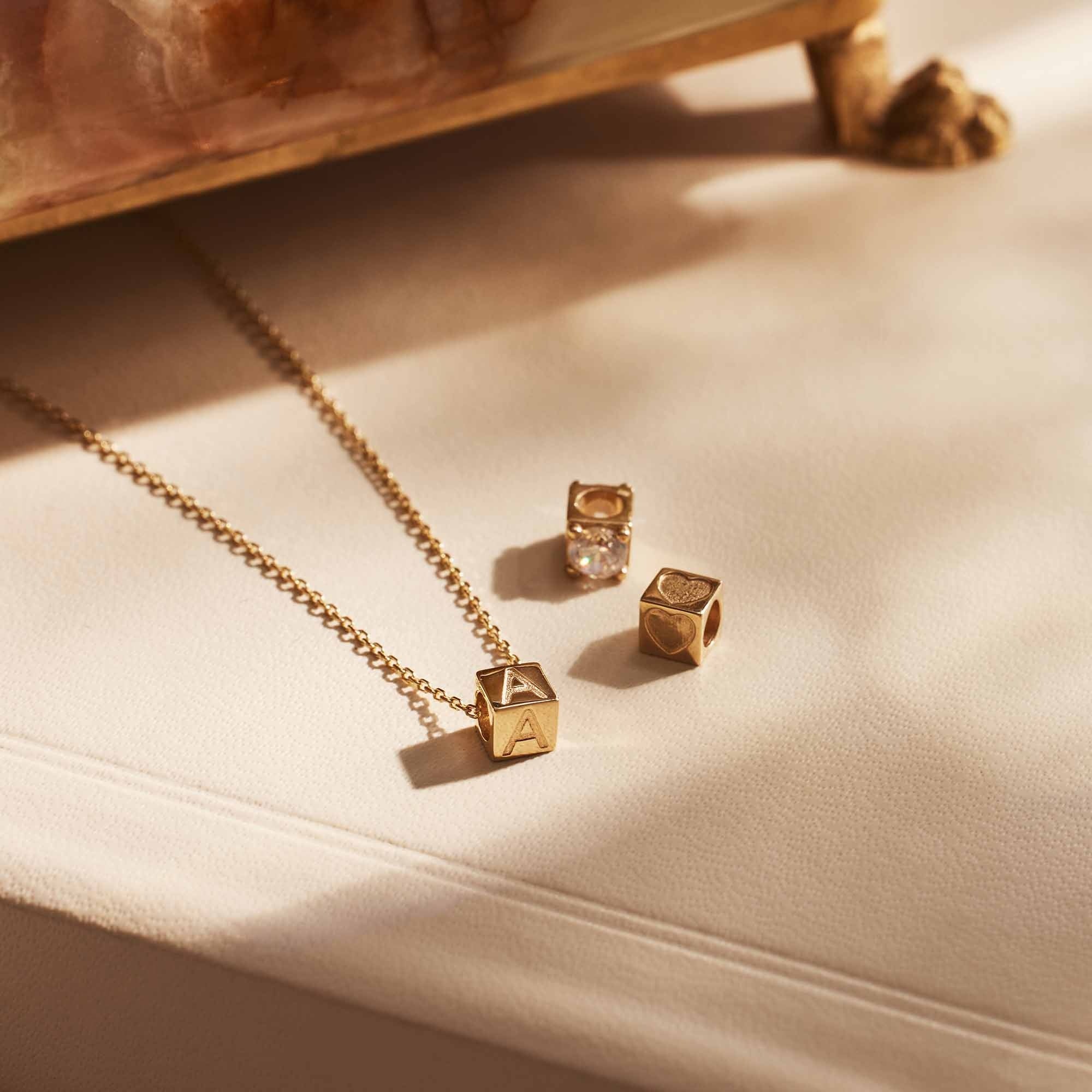 Le Marais Felie 14 karat gold cube charm with zirconia stone - Image 4