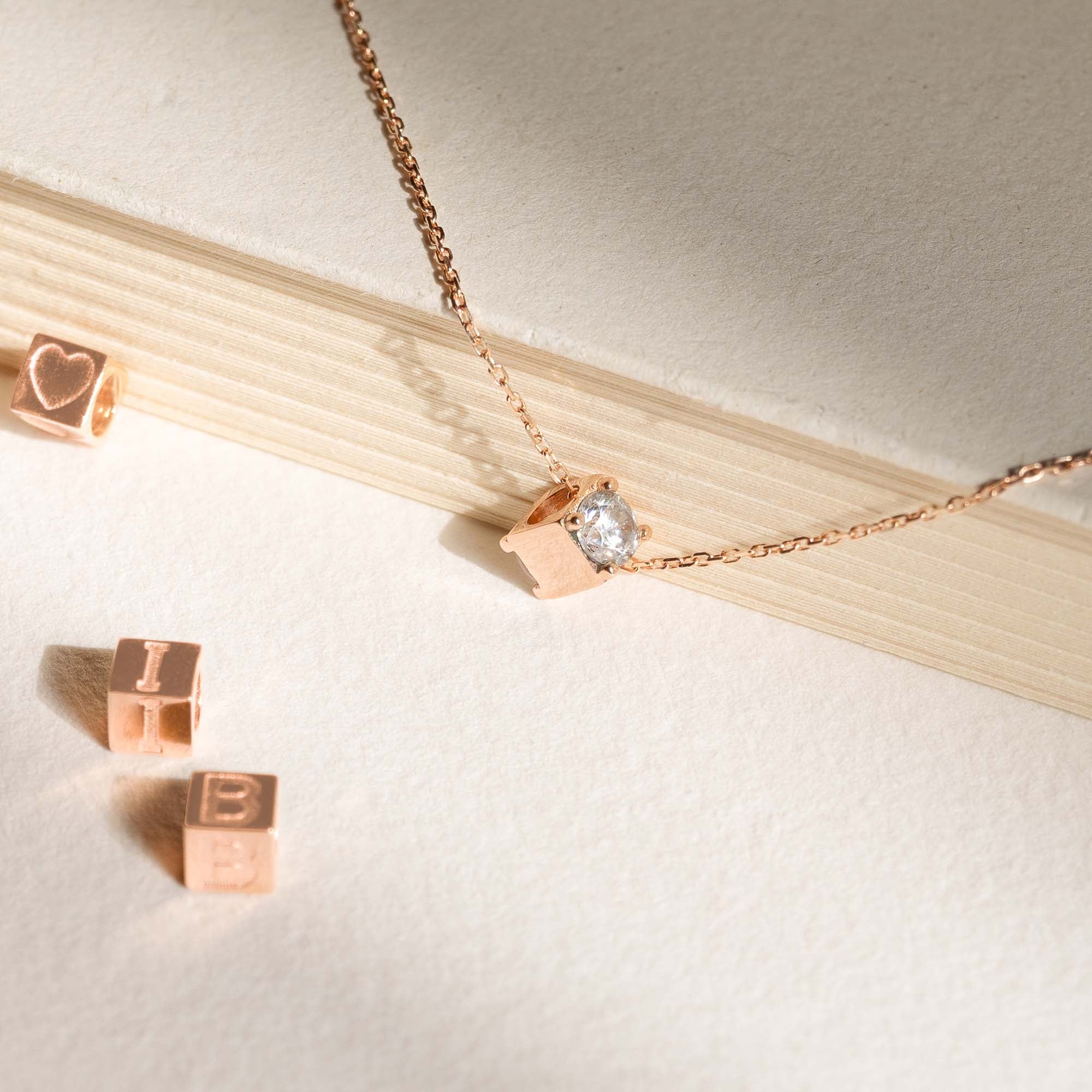 La Concorde Felie 14 karat rose gold cube charm with zirconia stone - Image 4