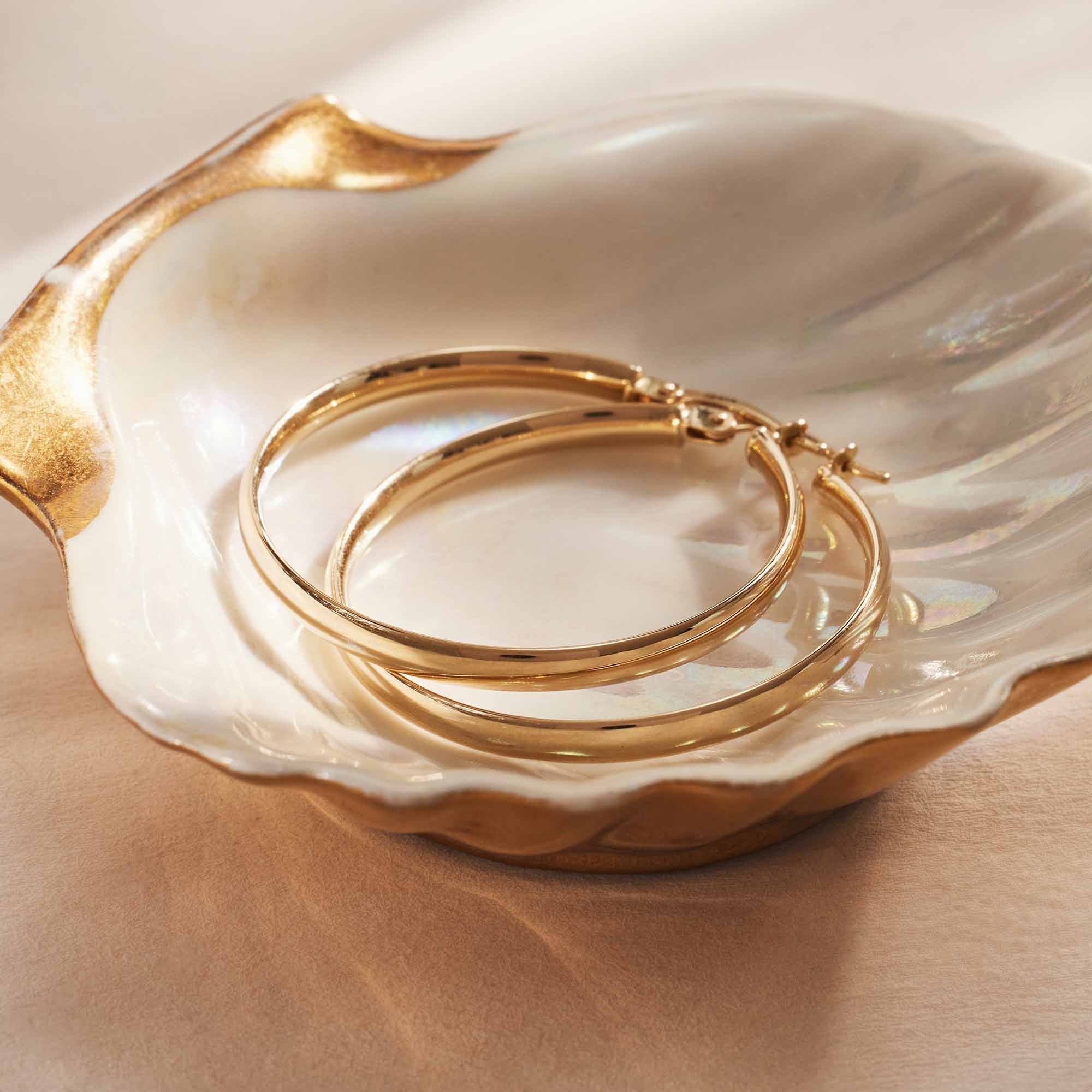 Rivoli Estrella 14 karat gold hoop earrings (32 mm) - Image 4