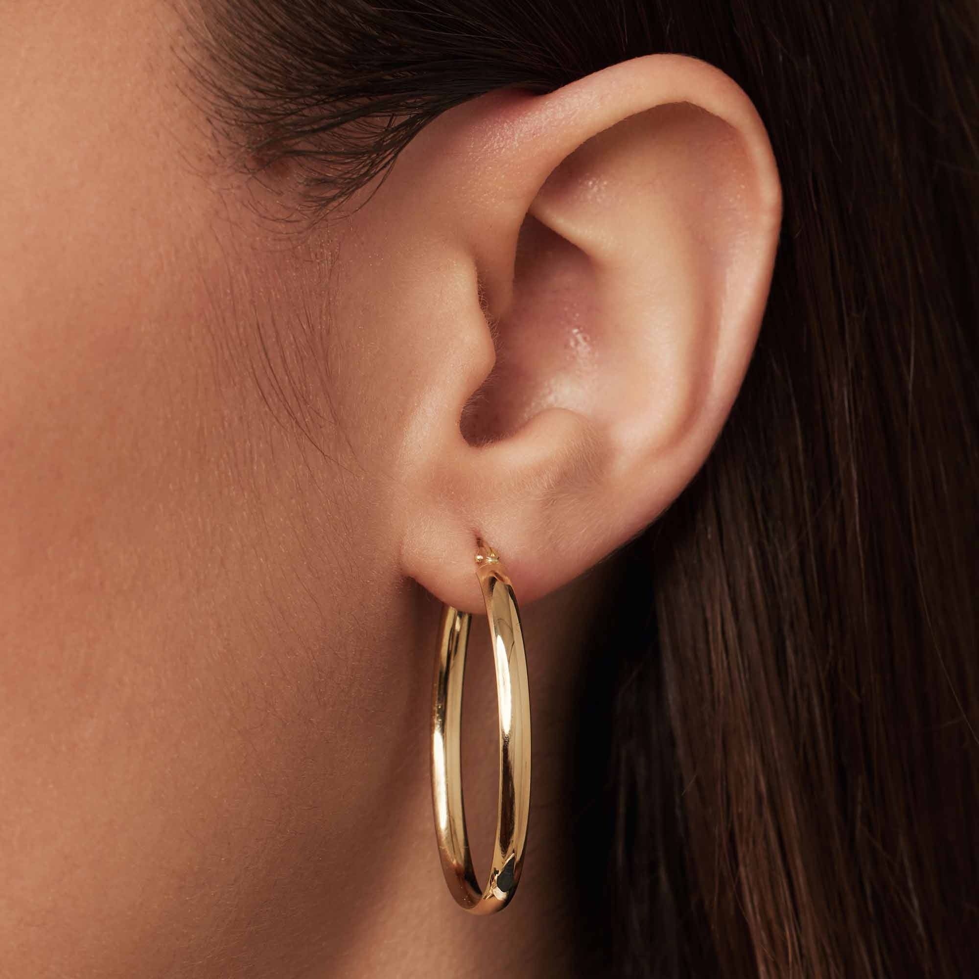 Rivoli Flori 14 karat gold oval hoop earrings (34 mm) - Image 2